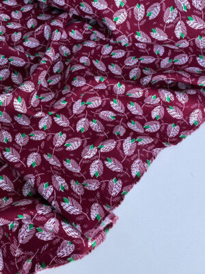 Тканина штапель бордовий з абстракційними листочками