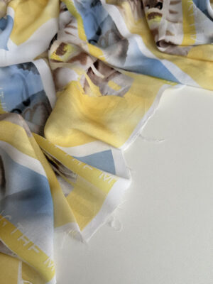 Штапель Італія блакитно-жовто-коричева графіка на білому