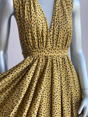 Віскозний шовк гірчичного кольору з чорними цятками типу лео