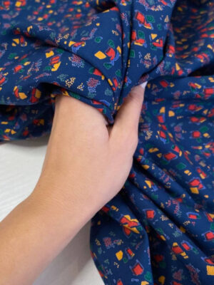 Штапель синій з мілким принтом типу калейдоскоп