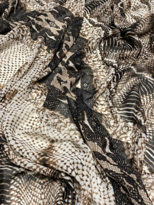 Шифон принт коричнево-бежевий енімал з чорними мереживними малюнками