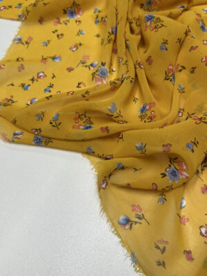 Шифон принт з блакитними квіточками на жовтому фоні