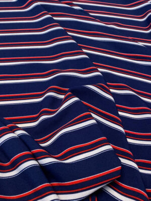 Платтяна крепова тканина в вертикальну червоно-білу смужку на темно-синьому (ширина синьоі 4,5см),