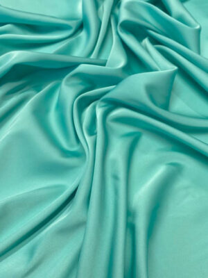 Однотонний стрейч шовк ніжно-бірюзового кольору