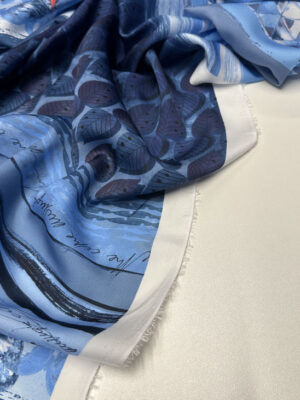 Шовк італійський яскравого синього кольору з абстракційними полосами та графічними малюнками в них