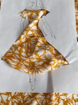 Штапель віскозний  білі квіти на жовто-гарячому фоні