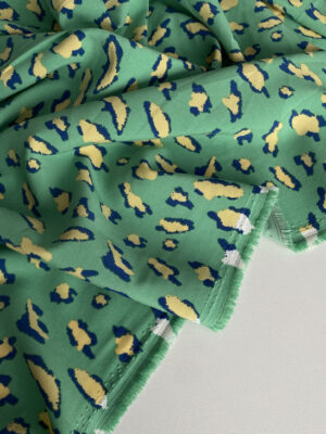 Суперсофт зеленого кольору з бежевими ляпками типу лео