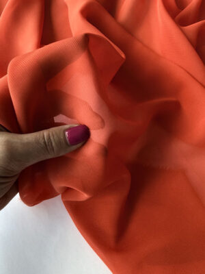 Шифон помаранчового кольору гладкий прозорий