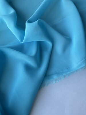 Шифон прозорий блакитно-бірюзового відтінку