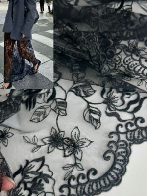 Стрейчовий гіпюр чорного кольору з вишитими квітами та фігурними фестонними кромками