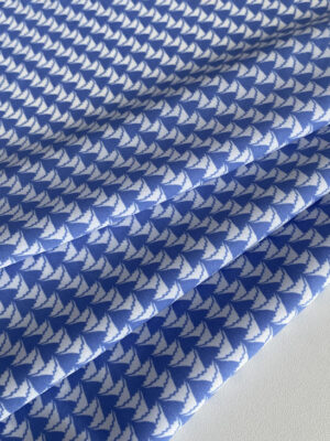 Суперсофт з міленькими блакитнии графічнми фігурами на білому фоні