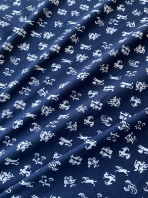 Котон темно-синій зі знаками зодіаку білого кольору