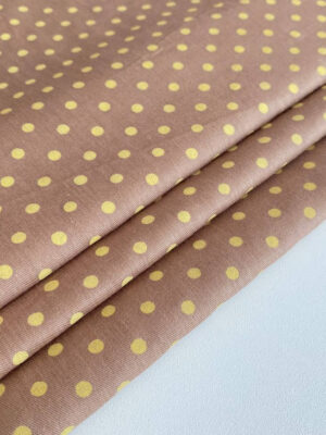 Котон полірований бежевого кольору з жовтими горошками діаметром 4мм