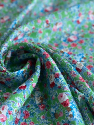 Штапель нейлон з міленькими квіточками на зеленкувато-шалфейному фоні