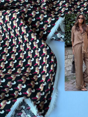 Тканина штапель з міленьким бежево-коричнево-бордовим графічним принтом на чорному фоні