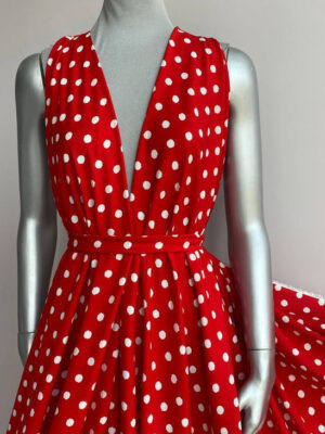 Тканина штапель  червоний з білими кругами нерівноі форми 1*1см